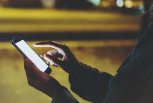 Person accessing professional help on a mobile phone