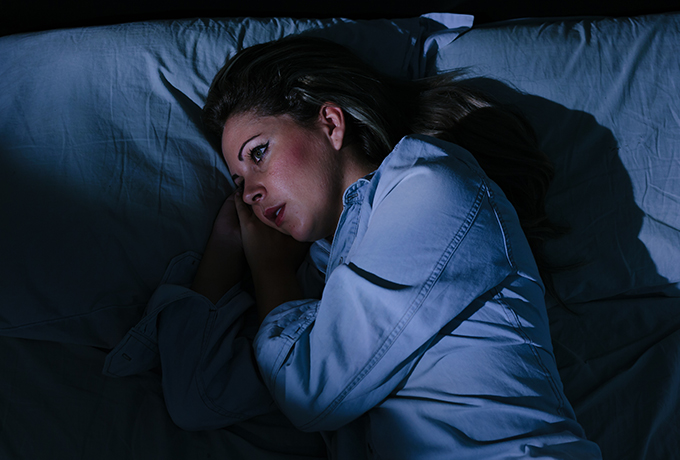 Women sleeping worrying about mental health issues