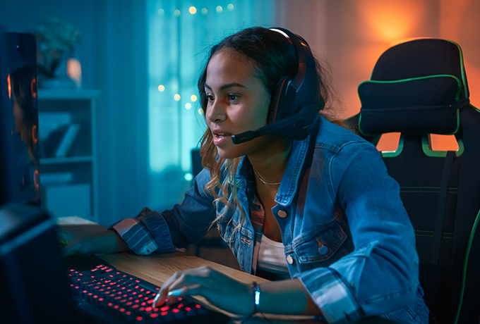 A woman connecting with others playing and online video game